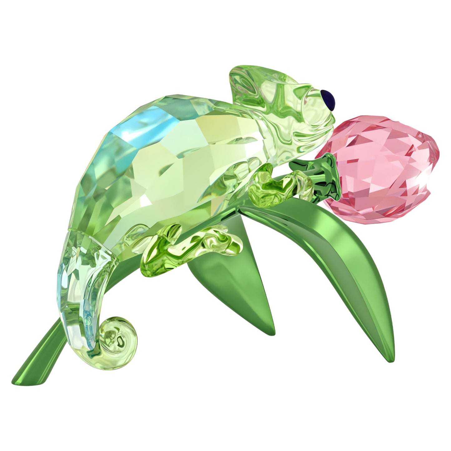 Crystal chameleon figurine on a pink flower with green leaves on a white background