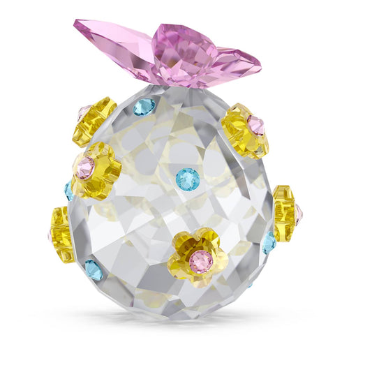 Crystal ball with colorful gemstones on a white background