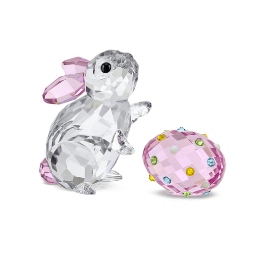 Crystal rabbit figurine with pink embellishments and a matching egg on a white background