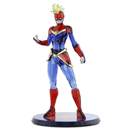 A multicolored figurine of Captain Marvel in her signature red and blue suit, with lacquered metal accents and a base, designed with precision.