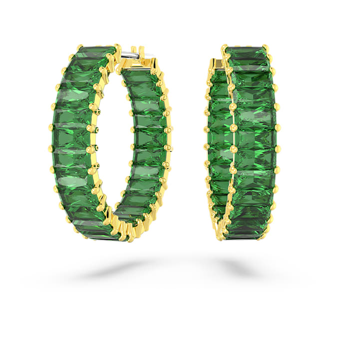 A pair of gold-colored hoop earrings with green gemstones