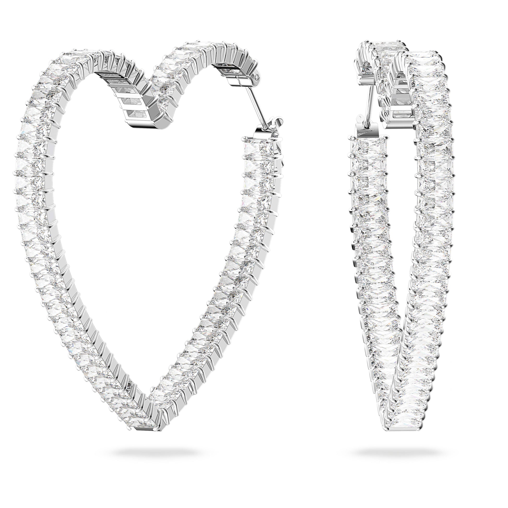Heart-shaped crystal hoop earrings on a white background