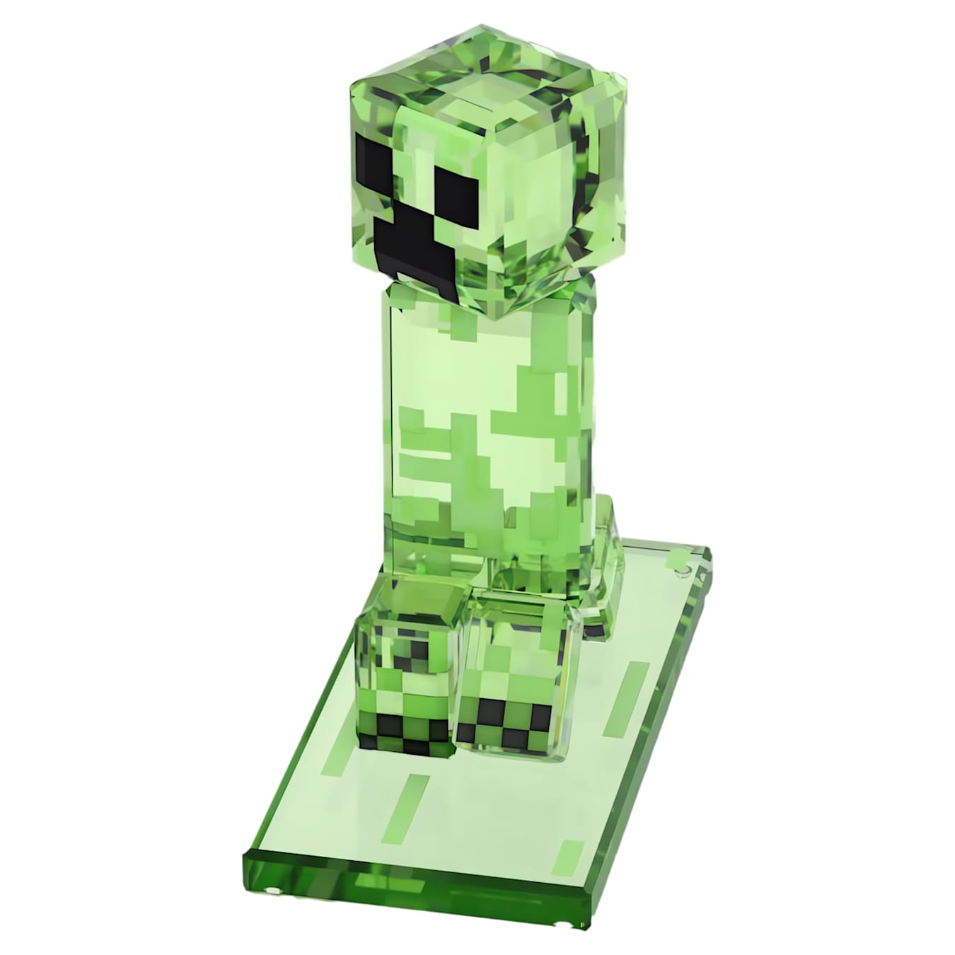 Green pixelated character figurine on a white background