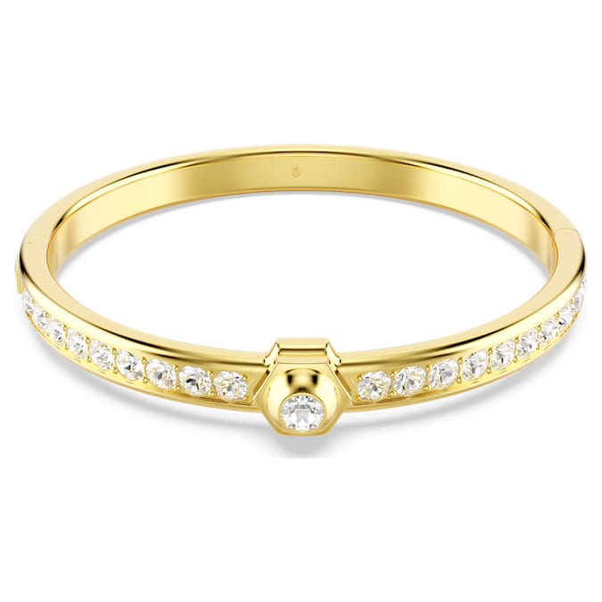 A gold-tone plated bangle bracelet with round cut white crystals set around its circumference, featuring a larger crystal in the center.