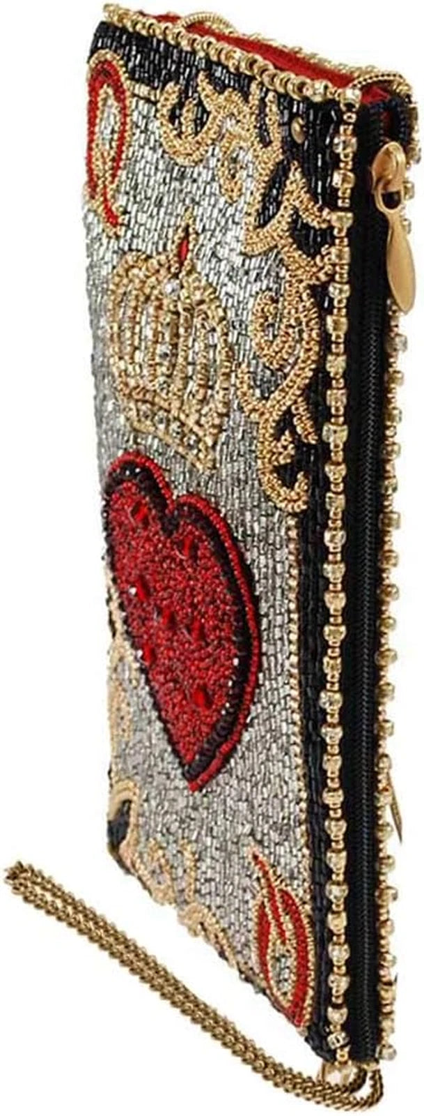 Beaded handbag with intricate patterns on a plain background