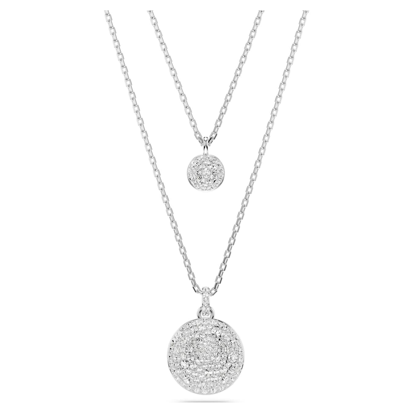 A layered pendant necklace with the top layer featuring a small circular pendant and the bottom layer showcasing a larger, intricate circular pendant, both in silver tone.