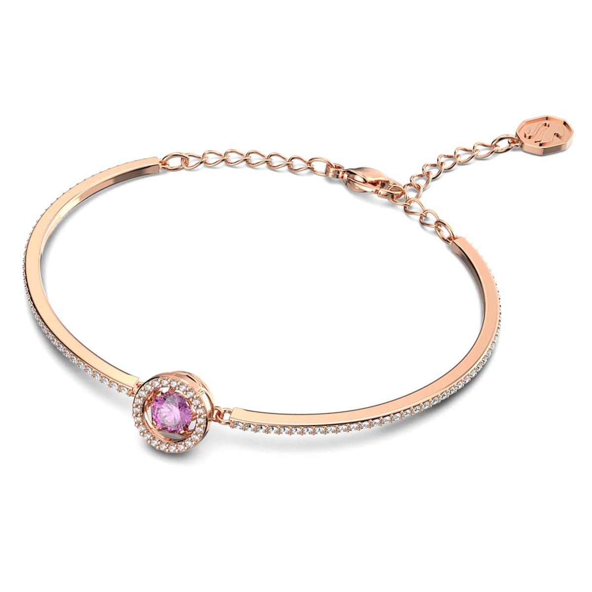 A rose gold-tone plated bangle bracelet with a purple centerpiece surrounded by clear crystals.