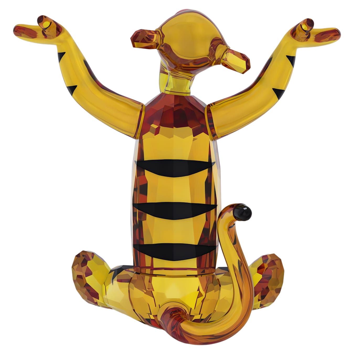 Crystal figurine of a tigger with arms raised on a white background