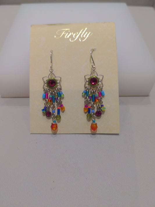 A pair of multicolored earrings with silver wire detailing and embellished with Swarovski crystals, displayed on a card.