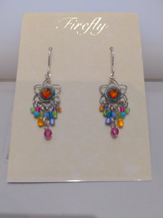 A pair of multicolored Firefly jewelry earrings on a silver wire displayed on a beige card with the brand name 'Firefly' at the top.