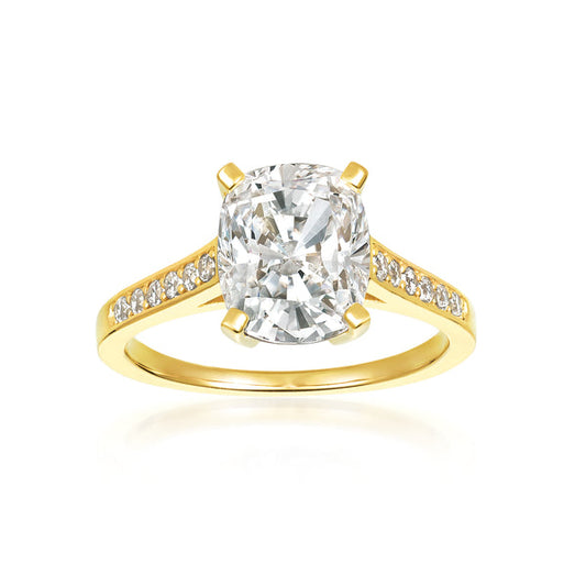 A cushion cut ring with a total weight of 3.70 carats, set in a yellow gold plated.