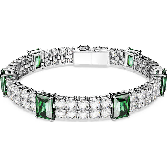 A rhodium-plated tennis bracelet with mixed cuts featuring green and clear crystals.