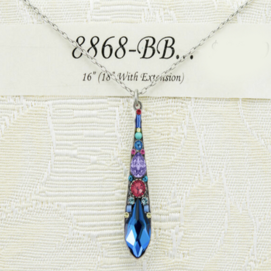 A Bermuda Blue necklace by FIREFLY JEWELRY, featuring a teardrop-shaped pendant with multicolored embellishments, displayed against a white textured background.