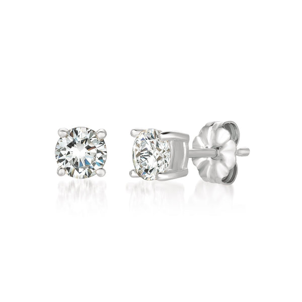 A pair of solitaire brilliant-cut stud earrings crafted in .925 silver and finished in pure platinum with a 1.0 carat total weight, set against a white background.