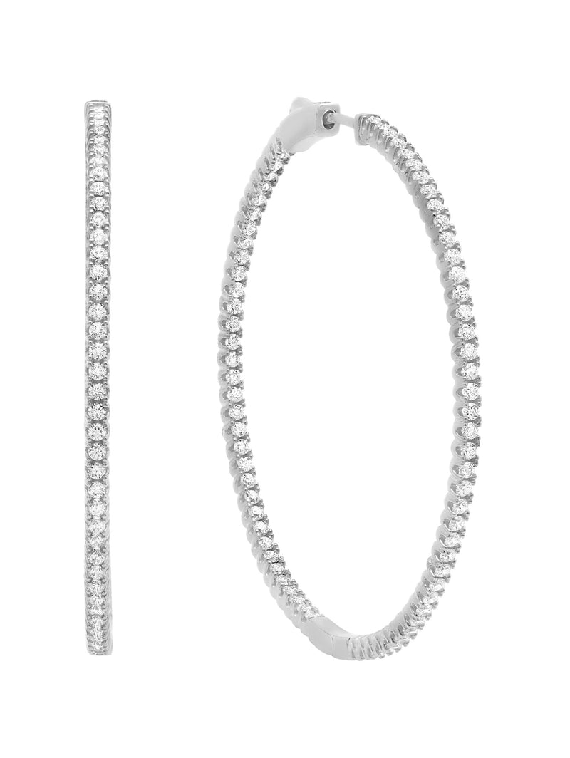 A pair of medium pave hoop earrings with a silver finish, adorned with cubic zirconia.