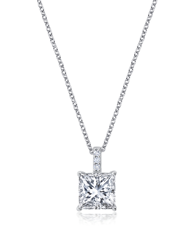 A silver-colored necklace with a single central cubic zirconia pendant, set in a bezel-style mounting.