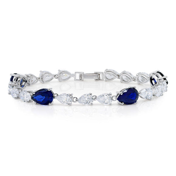 CLASSIC PEAR TENNIS BRACELET WITH SAPPHIRE FINISHED IN PURE PLATINUM