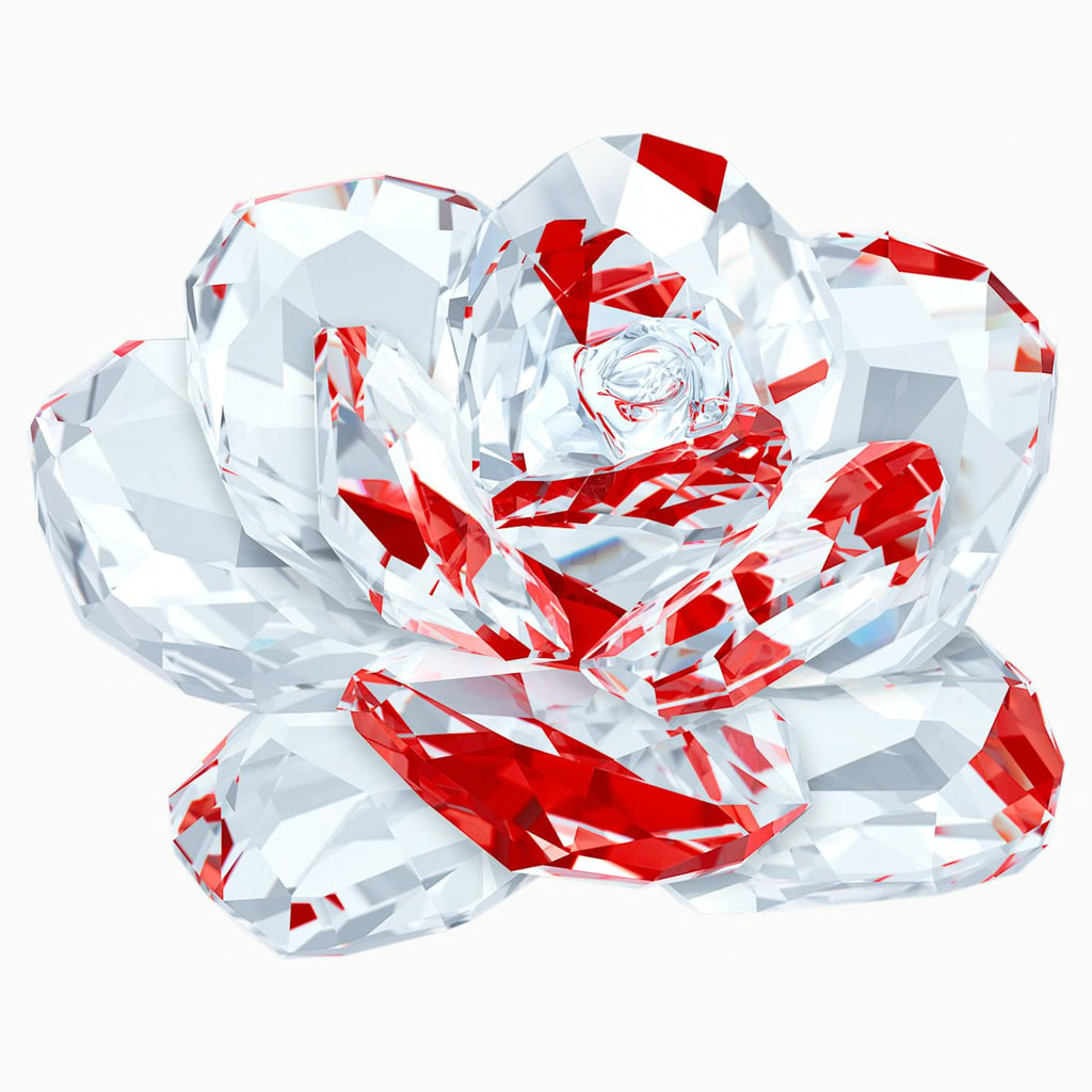 A Swarovski crystal figurine of a rose with red and clear crystal petals.