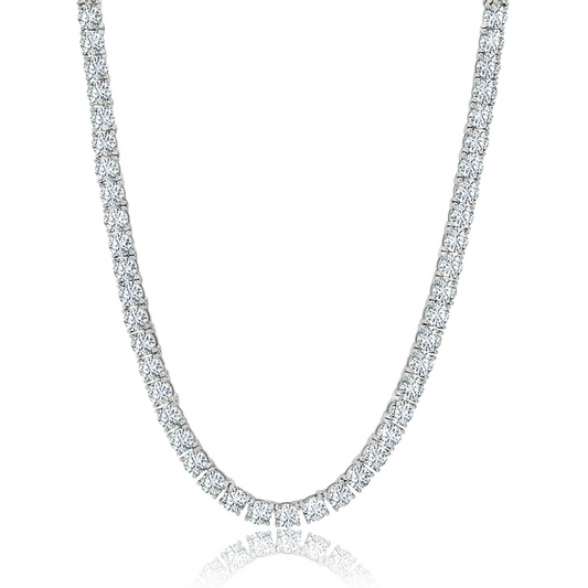 A tennis necklace made of silver with a pure platinum finish, featuring a series of connected cubic zirconia pendants.
