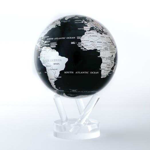 Mova globe black and silver in white background.