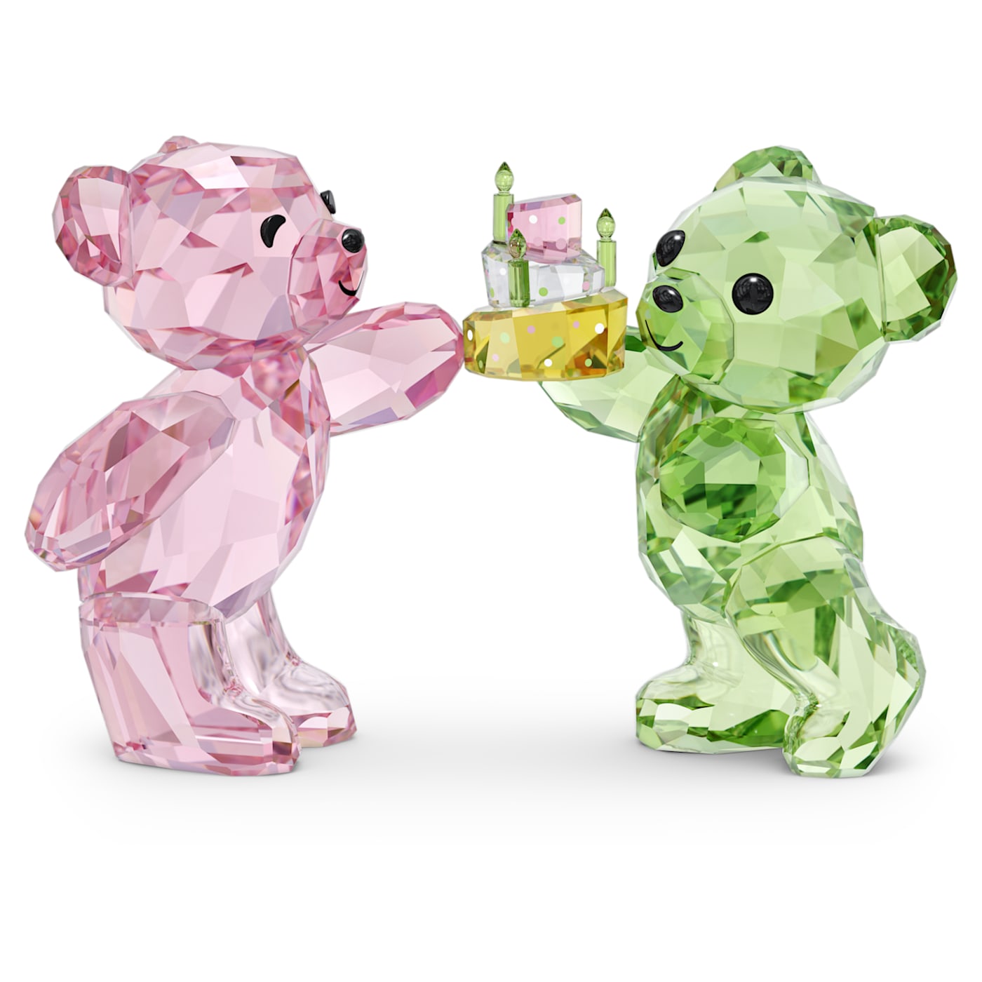 A crystal figurine of two bears, one pink and one green, holding a birthday cake.