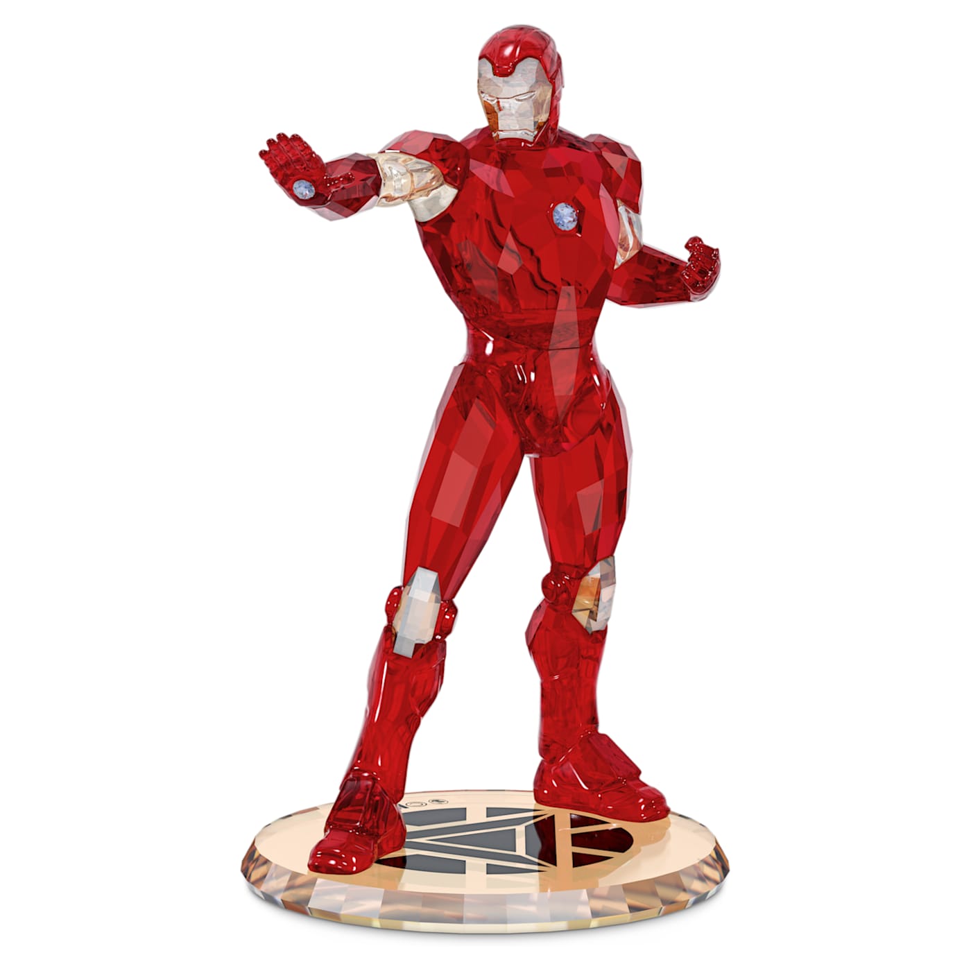 A crystal figurine of Iron Man in a dynamic pose with a red suit and visible underneath layers, on a gold base with the Swarovski crystal brand logo.