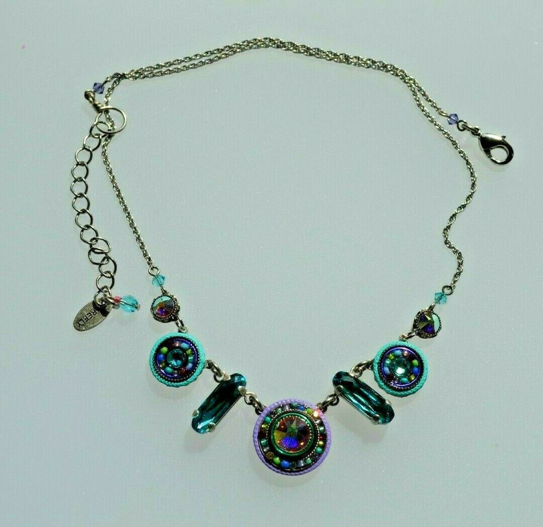 A full view of multicolored beaded necklace.