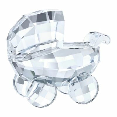 A clear crystal figurine of a pram.