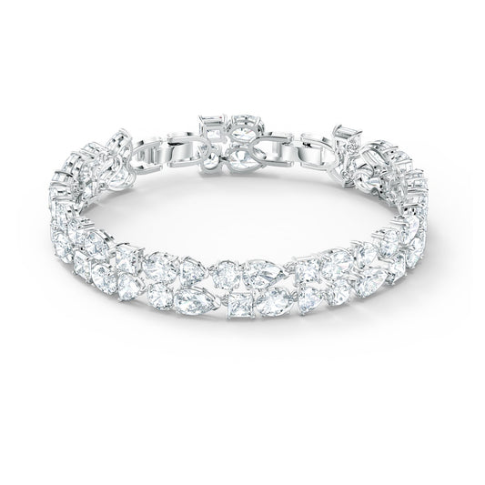 A deluxe bracelet with mixed cuts, featuring white rhodium-plated stones in a foldover clasp design.