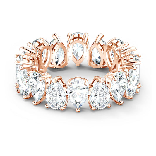 A rose gold-tone plated band ring with pear cut white zirconia stones arranged in a single row.